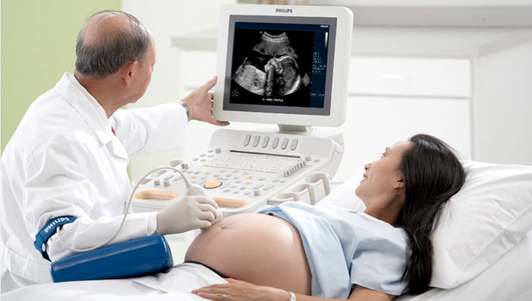 When is an ultrasound performed during pregnancy